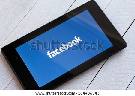 KIEV, UKRAINE - March 29: Facebook social network logo on tablet, in Kiev, Ukraine, on March 29, 2014.