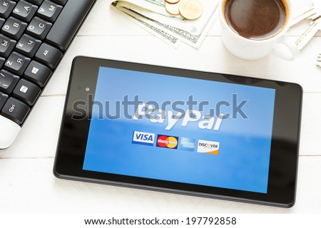 KIEV, UKRAINE - June 9: PayPal payment system logo on tablet, in Kiev, Ukraine, on June 9, 2014.