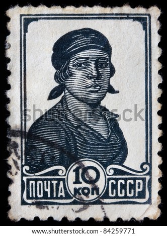 USSR - CIRCA 1936: A stamp printed in the USSR shows portrait of soviet female worker, circa 1936