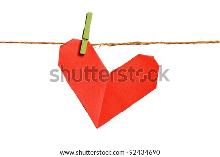 Paper origami heart on rope