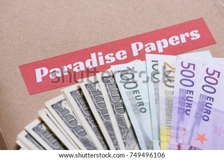 Paper folder with Paradise papers label on it with euro and dollar currency, offshore tax heavens documents leak concept