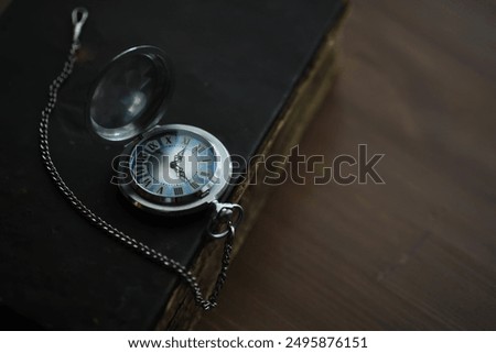 Similar – Image, Stock Photo Antique mechanical pocket watch in a elderly womans wrinkled hands