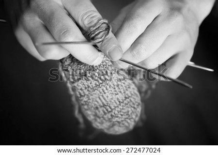 skein of yarn to knit socks spokes monochrome