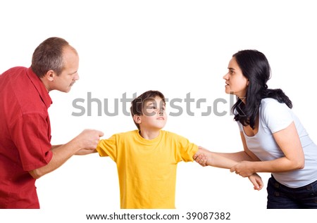 Hands of parents fighting over their son each pulling him their way.
