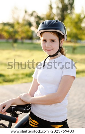 Similar – Image, Stock Photo 11 Cyclists ride one after the other on a dam