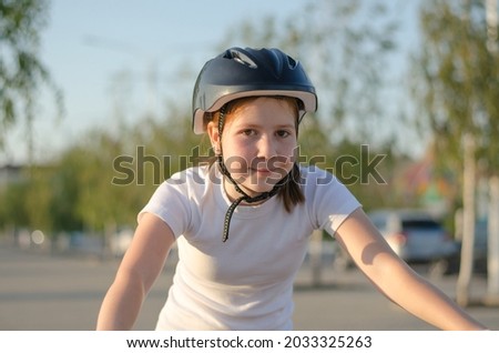 Similar – Image, Stock Photo 11 Cyclists ride one after the other on a dam