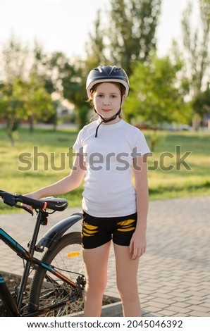 Similar – Image, Stock Photo 11 Cyclists ride one after the other on a dam