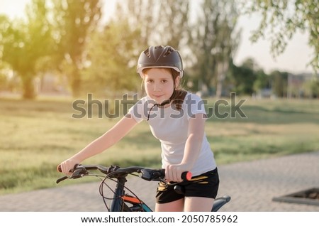 Image, Stock Photo 11 Cyclists ride one after the other on a dam