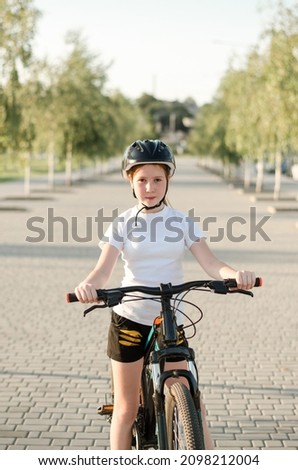 Similar – Image, Stock Photo 11 Cyclists ride one after the other on a dam