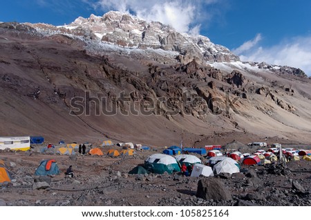 MENDOZA, ARGENTINA - JAN 12: Plaza de Mulas base camp. It is the goal of long and hard trekking, and the start point for summit attempts. Jan 12, 2012 in Aconcagua Mount, Mendoza, Argentina.