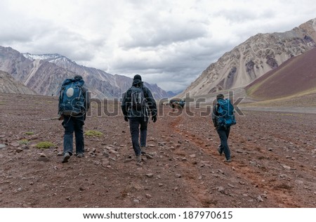 MENDOZA, ARGENTINA - JAN 18: Unidentified climbers returning from Plaza de Mulas. This year 5400 people faced the mountain intend to get the summit. Jan 18, 2014 in Aconcagua Mount, Mendoza, Argentina