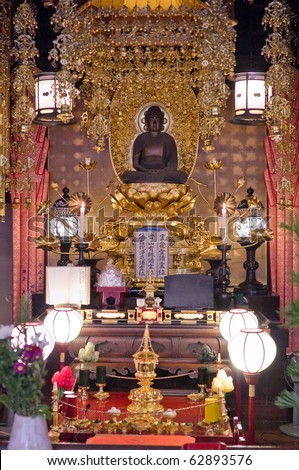 NAGOYA - JUL 28: Yagoto-zan Koushoji temple interior view, with a Buda sculpture. Japan preserves the traditions and historic heritage for citizens and visitors. Jul 28, 2010 in Nagoya, Japan.
