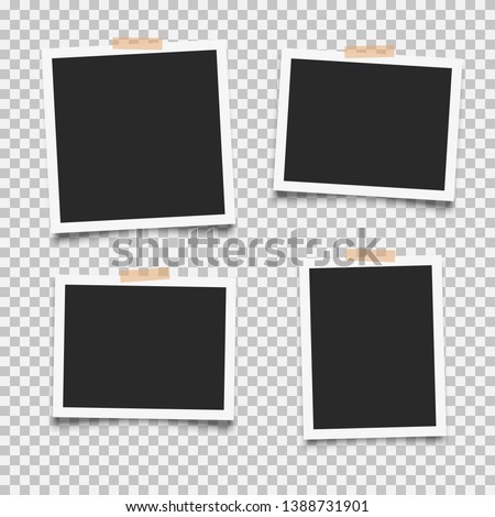 Set of empty photo frames with adhesive tape