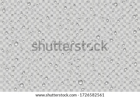 Water droplets on a transparent glass. Rain drops on window.