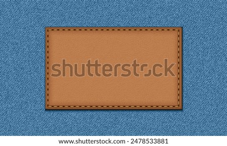 Blue jeans texture. Denim background. Leather badge, denim label.