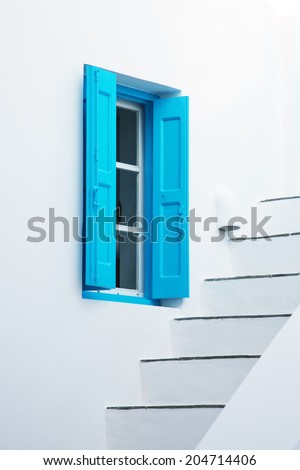 Detail of a typical Greece house with blue shuters