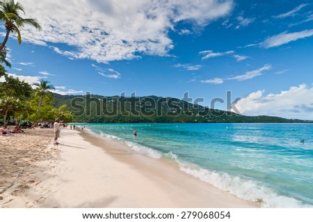 MAGENS BAY, ST. THOMAS, U.S. VIRGIN ISLANDS - DECEMBER 5: People enjoy a sunny afternoon at the Magens Bay beach, voted Top ten beach by National Geography, St. Thomas, U.S.V.I. at December 5, 2011.