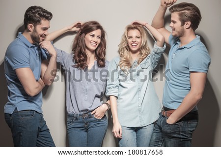 happy group of young casual fashion people laughing together