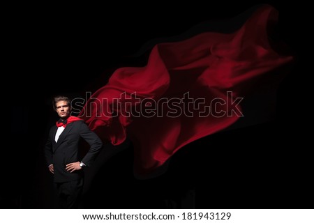super hero business man in red cape
