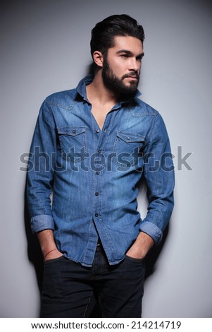 Handsome man in blue shirt with his hands in pocket