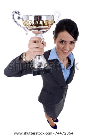 wide angle picture of an attractive business woman winning a cup