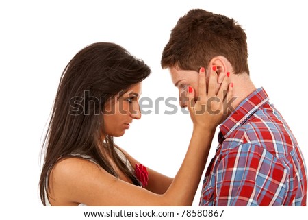 Portrait of young couple face to face over white