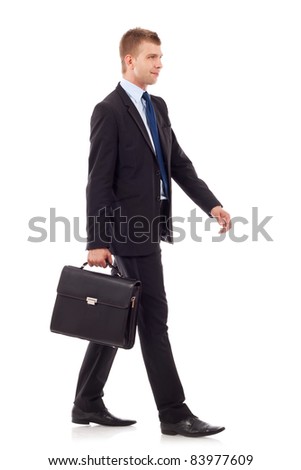 Business Man Holding Brief Case And Walking Over White Background Stock ...