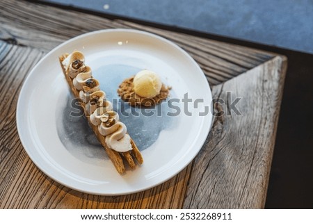 Similar – Image, Stock Photo Tasty high cuisine dessert with ice cream and strawberry