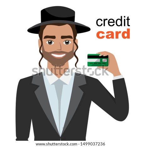 Young jew man smiling, showing, presenting credit card for making paymen.