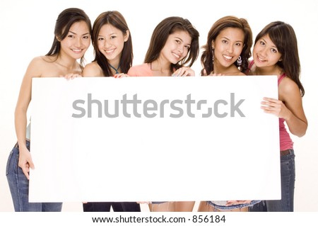 Five pretty young asian women hold a big blank white sign