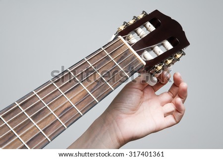 tuning guitar