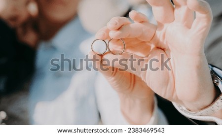 Similar – Foto Bild Neuvermählte mit ihren Ringen. Schuhe von Bräutigam und Braut.