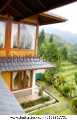 Defocused and blurred image of a villa with a natural concept that blends with nature and traditional touch. 商業照片 © 