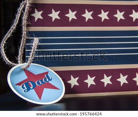 Gift for Dad. Stars & Stripes gift bag with name tag on burlap string.