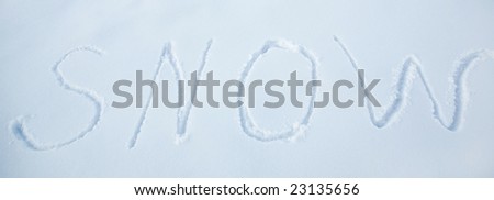 word snow written on the snow