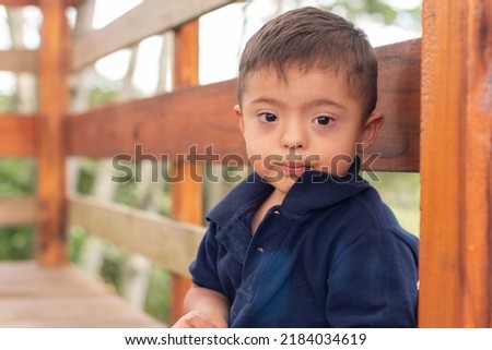 Similar – Image, Stock Photo Latin boy with Down syndrome cooking salad together