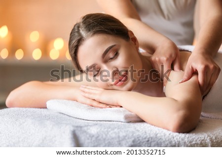 Similar – Image, Stock Photo Woman relaxing on massage chair