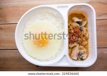 Freeze of basil Fried Chicken and fried egg (convenience food)
