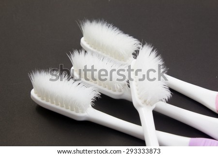 old toothbrush background black