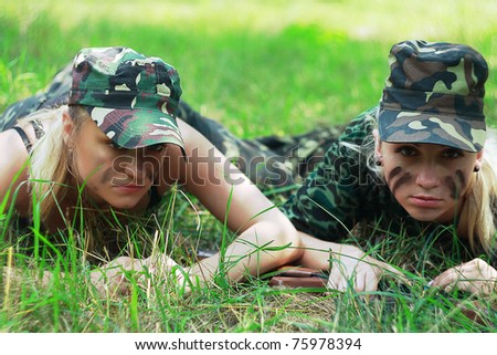 portrait two blonde girls in military form