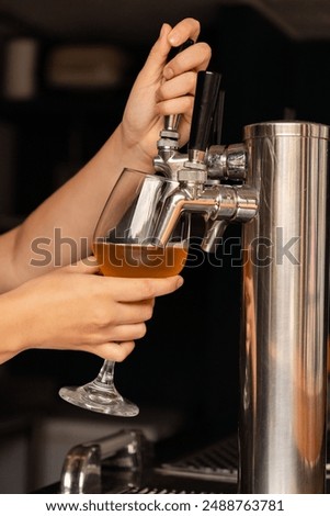 Similar – Foto Bild Kellnerin zapft Zapfhahn-Bier in einer Bar