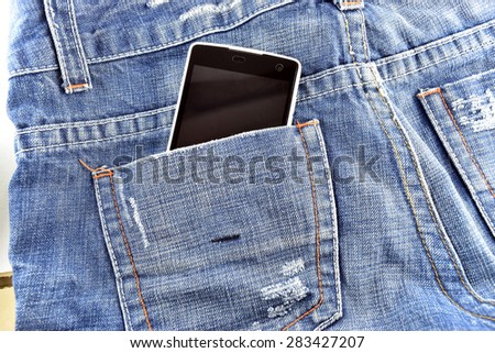 Black phone in your pocket blue jeans background