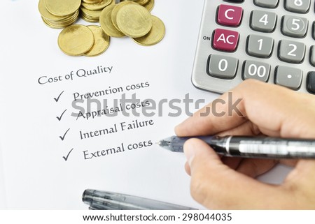women hand and pen writing element of Cost of Quality on white paper with money and calculator. concept for business.