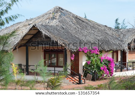 guest house with thatched roof in Mui Ne, Southern Vietnam