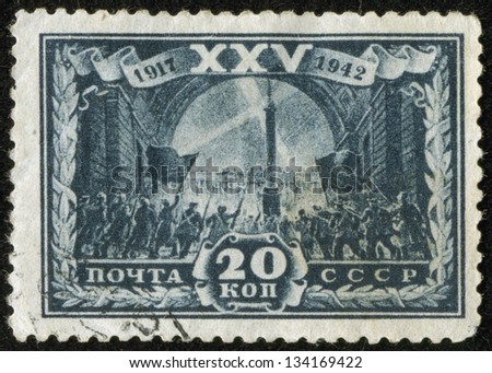 SOVIET UNION - CIRCA 1942: A stamp printed by  SU Post is devoted to the 25th convention of Communist party. It shows the Russian revolution Ã?Â¢?? capture of Winter Palace in St. Petersburg, circa 1942