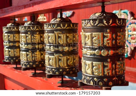 IVOLGINSKY, RUSSIA - SEPT 11, 2009: Praying drums (written prayers are rolled inside - people believe they pray rotating them) at Ivolginsky Buddhist temple, the main Buddhist centre of Russia.