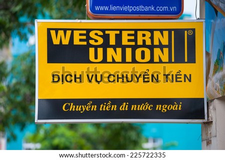 HO CHI MINH, VIETNAM - JULY 7, 2014: A sign of Western Union in the downtown. The Western Union Company is a financial services and communications company based in the United States, founded in 1851.