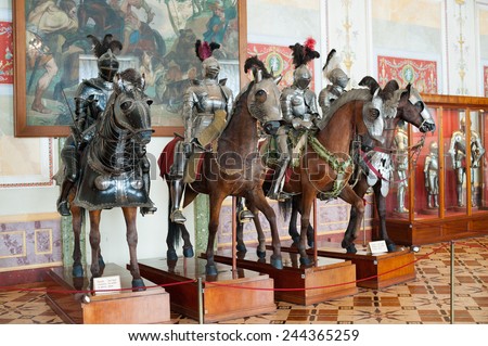 ST. PETERSBURG - JUNE 30, 2011: Knights mannequins on horses at Knights Hall of the Hermitage. It hosts a part of the Hermitage Arsenal collection.