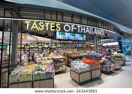 BANGKOK - MARCH 18; 2015: Unidentified people shop food at a duty free shop at the International Airport Suvarnabhumi which is the sixth busiest airport in Asia.