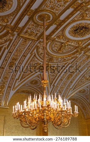 ST PETERSBURG - JUNE 30, 2011: A chandelier in one of halls of the Hermitage Museum. Today the collection of the museum contains about 3 million items.